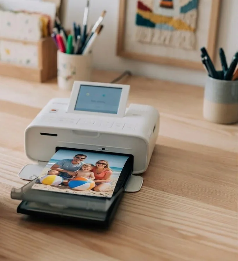 Fotodrucker druckt ein Foto direkt vor Ort aus